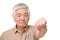 Senior Japanese man with thumbs down gesture