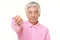 Senior Japanese man with thumbs down gesture