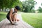 Senior jogger tighten her running shoe laces