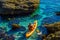 Senior kayaker on a kayak by the sea, active water sport and lei