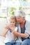 Senior knitting with her granddaughter