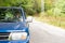 Senior lady drives the car in outdoor