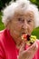 Senior Lady Eating A Waffle