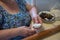 Senior lady making dumplings with stuffing