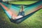 Senior lady relaxing in a hammock