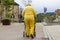 senior lady in yellow dress with rollator