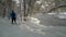 Senior make hiker is walking in a deep fresh snow