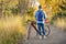 senior male cyclist with a touring gravel bike on a trail in northern Colorado