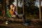 Senior male hiker taking coffee break during active walk adventure outdoors