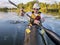 Senior male paddler in a fast kayak