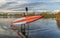 Senior male stand up paddler on a lake