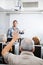 Senior Male Student Raising Hand In Computer Class