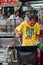 Senior man cooks noodles at the Kimberly Street Market, Penang