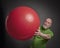 Senior man exercising with a large Swiss ball