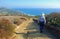 Senior man hiking hills above Laguna Beach, CA.