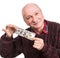 Senior man holding a stack of money. Portrait of an excited old businessman