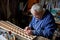 Senior man makes the wing of a radio-controlled aircraft, the construction of the airplane