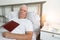 Senior man male bed home tired sick ill alone retired resting sleeping book