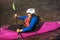 Senior man paddling kayak. Gray hair man enjoy river kayaking