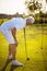 Senior man playing golf. Weekend activities