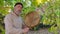 Senior man is playing shaman drum in a fall scenery