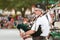 Senior Man Plays Bagpipes Before Old Soldiers Day Parade