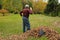 Senior Man Raking Leaves