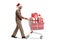 Senior man with a santa claus hat pushing a shopping cart with presents