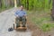 Senior man sleeping rest in forest