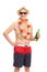 Senior man in a swim trunks holding a beer