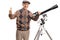 Senior man with a telescope looking at the camera and giving thu
