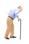 Senior man walking with cane