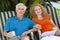 Senior Man and Woman Couple Enjoying Drinks