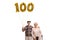 Senior man and woman with a golden number hundred balloon