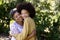 Senior mixed race woman and her daughter enjoying their time at a garden