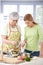 Senior mother and daughter cooking together