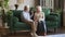 Senior older family couple having trust conversation sitting on sofa