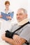 Senior patient broken arm in doctor office