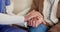 Senior patient, psychology or nurse holding hands for support or empathy for healthcare help. Closeup, consulting or