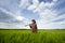 Senior peasant in barley field