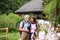 A senior pensioner couple with binoculars hiking, resting. Copy space.