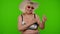 Senior pensioner woman tourist in swimsuit bra, red sunglasses and hat dancing celebrating, smiling