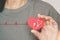 Senior people holding red heart with white stethoscope and heartbeat icon, heart checking, annual health checking, world health