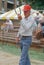 A senior playing a game of horseshoes