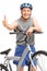 Senior posing behind bicycle and giving a thumb up