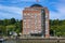 Senior residence in a brick building tower with glass dome on the place of the former cold store in the port of Hamburg, Germany,