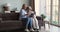 Senior retired mom aged daughter spend time together using touchpad