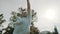 Senior retired woman dancing in the park. Close up low angle slow motion shot