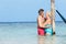 Senior Romantic Couple Standing In Beautiful Tropical Sea