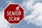 Senior Scam message on red street stop sign